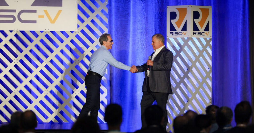 Andrea Gallo, CEO RISC-V International, and Phil Wennblom, Chair of ISO/IEC JTC 1, on stage at RISC-V Summit North America 2025